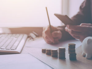Home budget calculation, man working financial figures